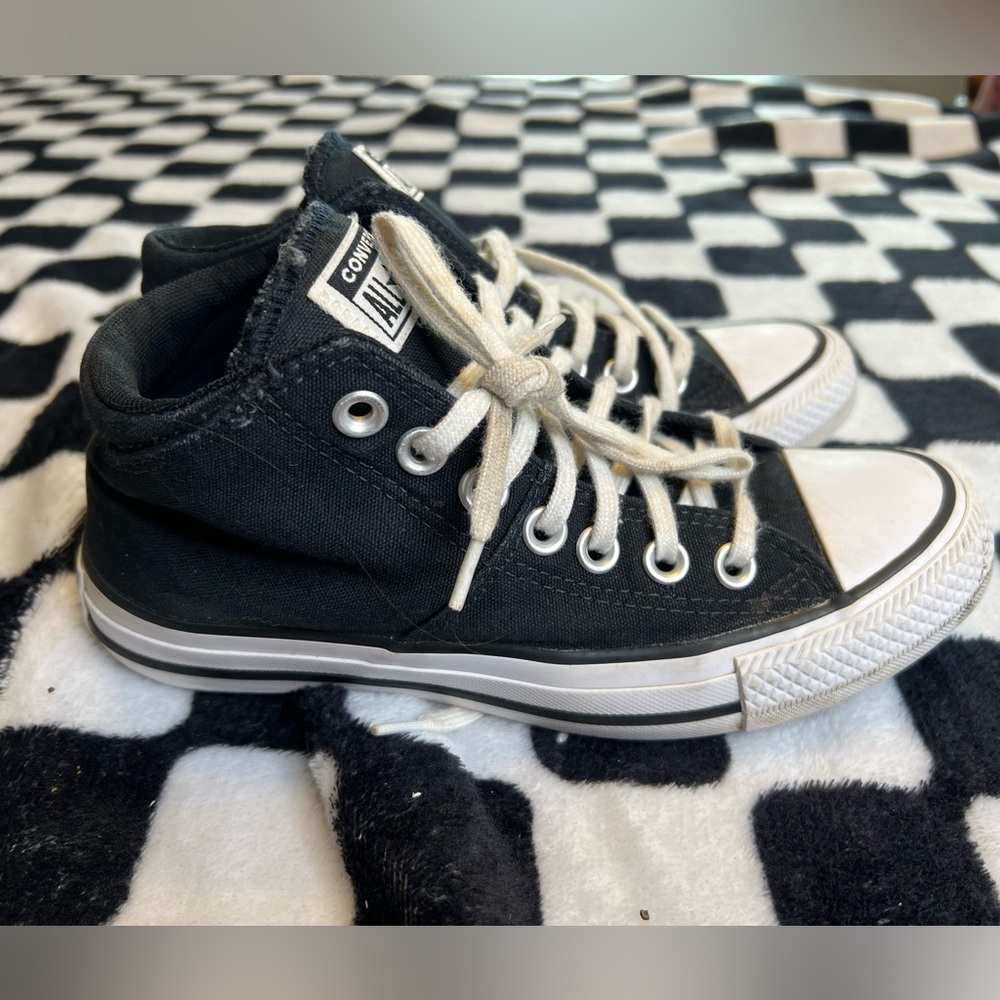 Black and white high top converse